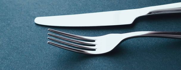 Fork and knife, silver cutlery for table decor, minimalistic design and diet - Фото, зображення
