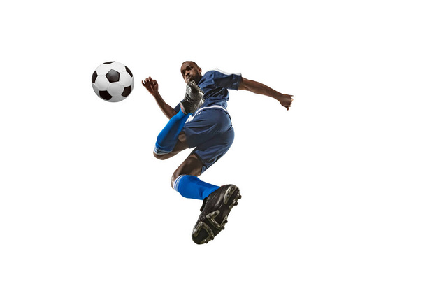 Football or soccer player on white background - motion, action, activity concept, wide angle - Valokuva, kuva