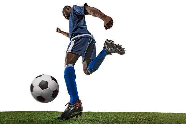 Football or soccer player on white background - motion, action, activity concept, wide angle - Foto, imagen