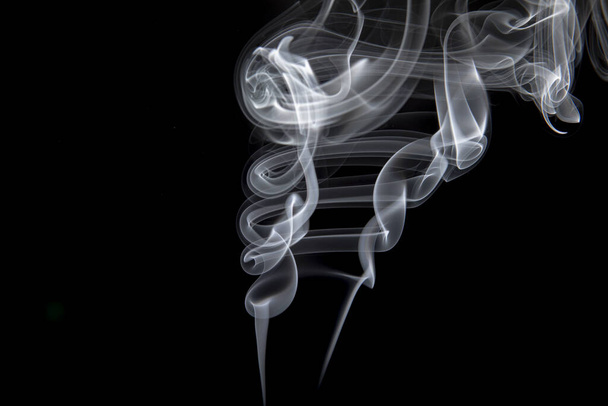 swirls of white incense smoke on a black background - Photo, Image
