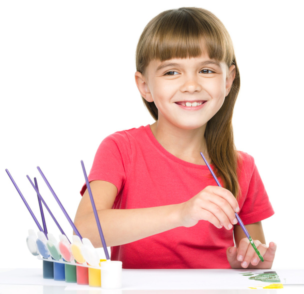 Little girl is painting with gouache - Zdjęcie, obraz