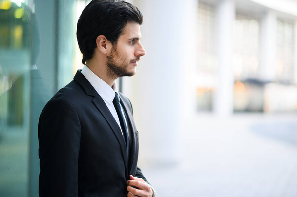 Young businessman outdoor in a serious expression - Photo, image