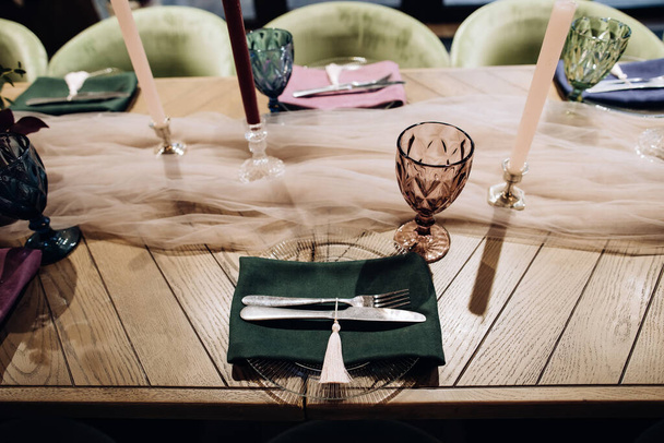 Wedding dinner table setting with silver knife and fork - Photo, Image