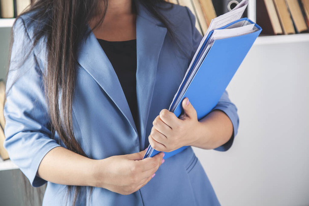 business woman hand document in office background - Фото, зображення