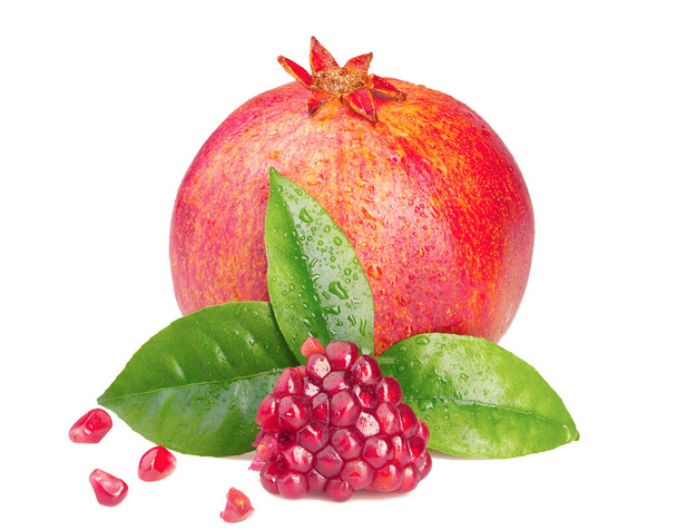 Ripe pomegranate with a leaf isolated on white background - Photo, Image