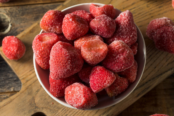 Organic Frozen Red Strawberries in a Bowl - Photo, image