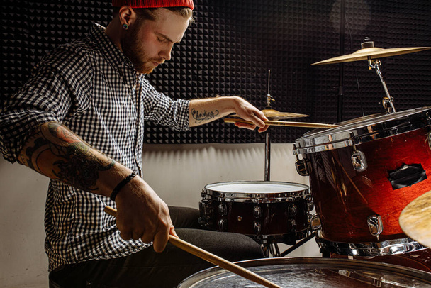 professional drummer play drums in studio - Photo, Image