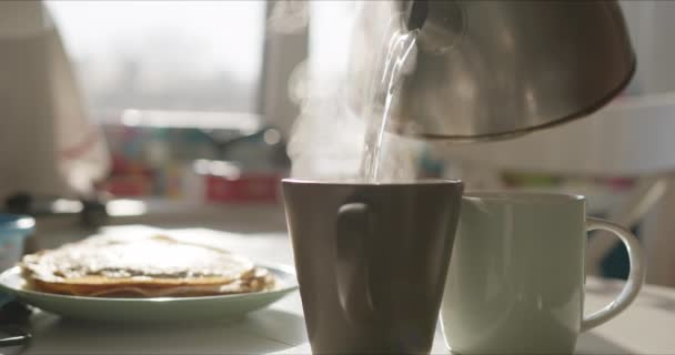 Steam rises beautifully over the cups - Filmmaterial, Video