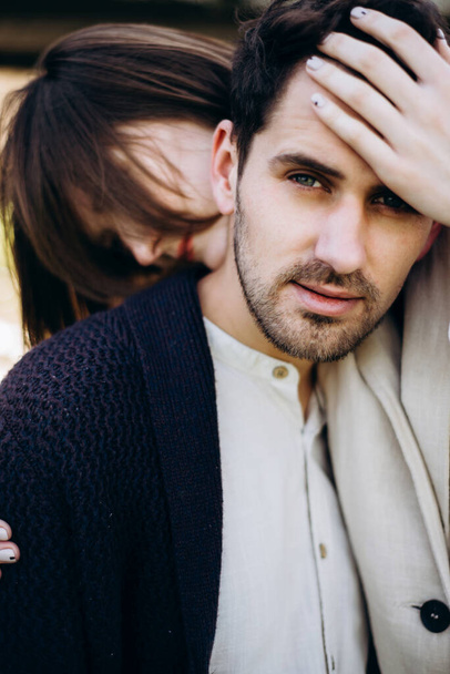 Closeup of lovely couple hugging outdoors - Foto, imagen