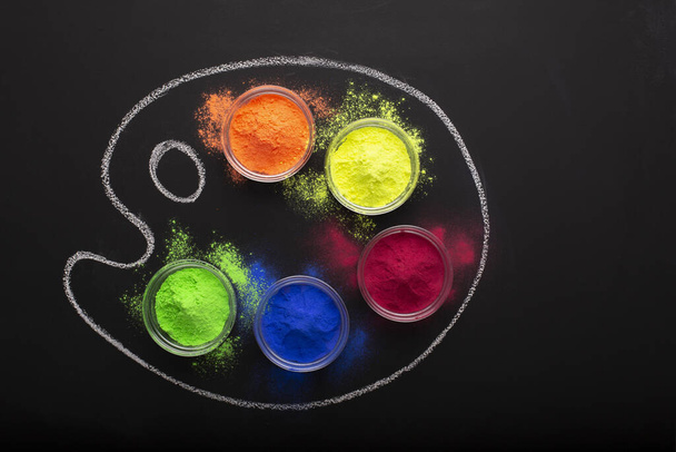 Dry paint in palette with drawn chalk - Photo, Image