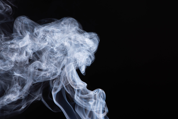 abstract white flowing smoke clouds on black background - Photo, Image
