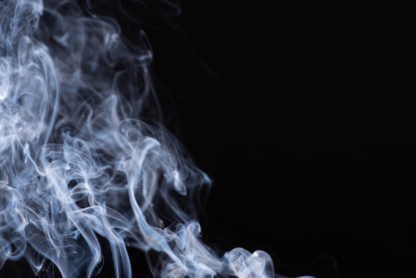 abstract white flowing smoke on black background - Foto, Imagem