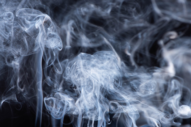 white flowing smoke clouds on black background - Photo, Image
