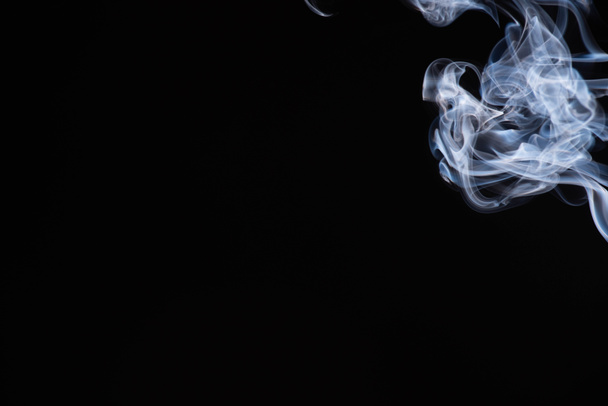 white flowing smoke cloud on black background with copy space - Fotó, kép