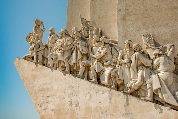 Lisbon, Portugal - September 2011: Close up view of carved figures on the Monument of the Discoveries on the bank of the Tagus River. - Foto, afbeelding