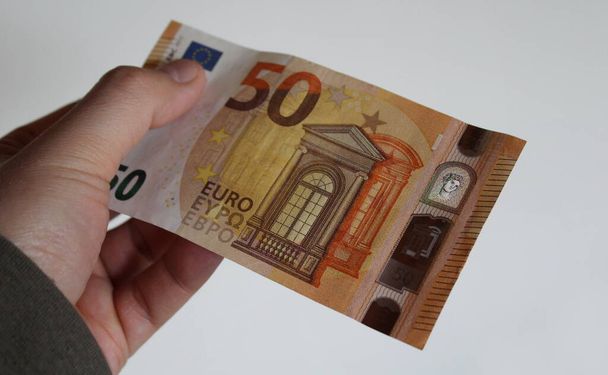 50 eurobankbiljetten - donatie en aanbieding - Foto, afbeelding