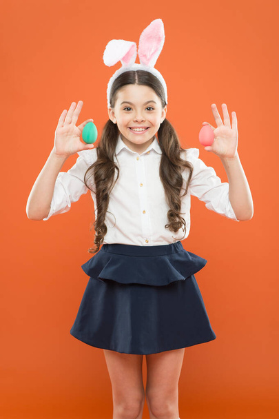 Easter is coming. small girl child wear bunny ears. happy easter. Egg hunt on spring holiday. Holiday celebration and preparation. Kid with painted eggs. Easter Eggs - Recipes and Cooking - Fotoğraf, Görsel