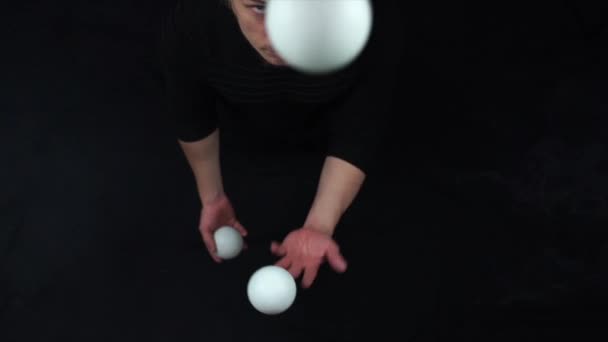 Closeup of man juggling balls. Concept of success, business and managing - Footage, Video