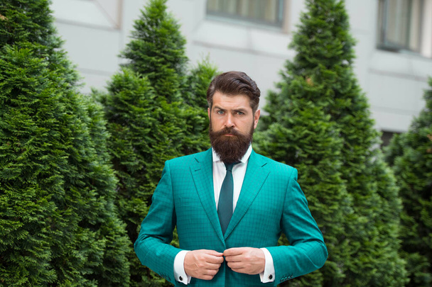 Successful and motivated. Business man bearded wear perfect fashionable suit. Businessman well groomed hairstyle beard. Business concept. Business life. Man businessman classic style urban park - Фото, зображення