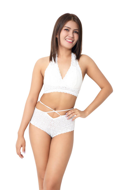 belle jeune femme modèle portant bikini blanc sur fond blanc
 - Photo, image