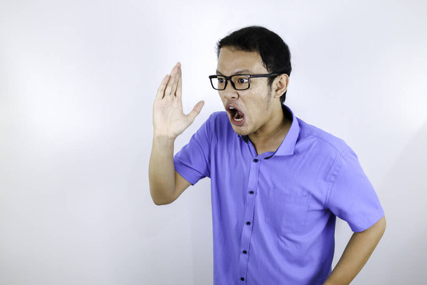Angry asian student blue shirt - Фото, зображення