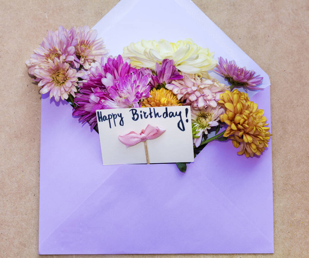 Flowers in Envelope Letter Full of Various Flowers  with Happy Birthday Card  - 写真・画像