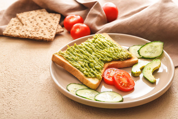 Plate with tasty avocado sandwich on table - Fotoğraf, Görsel