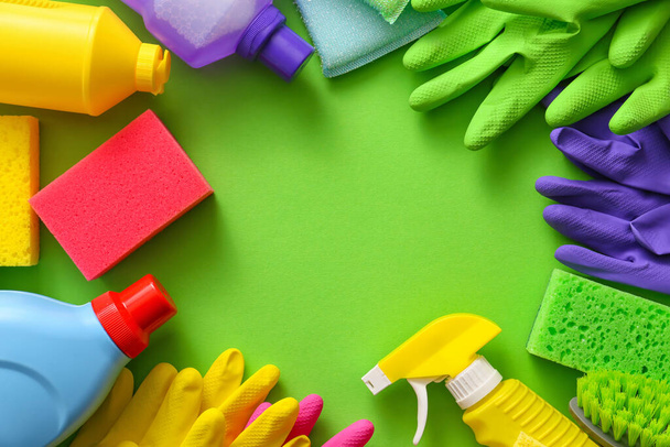 Set of cleaning supplies on color background - Foto, imagen