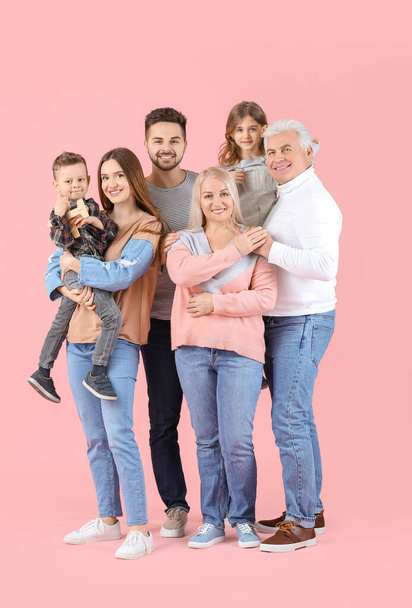 Portrait of big family on color background - Photo, Image