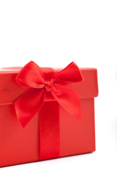 decorative red fabric bow on an ornamental Christmas or Valentines gift box - Φωτογραφία, εικόνα