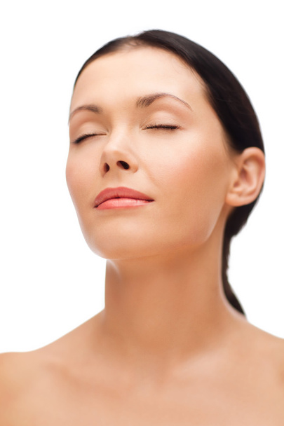 Relaxed young woman with closed eyes - Photo, Image