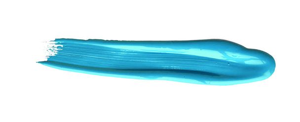 Бирюзово-голубой мазок кисти на изолированном фоне, холст акварельной текстуры - Фото, изображение
