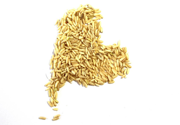 Неотполированный белый рис. Естественное зерно. Длинный рис Полезный продукт. Диетическая еда. Дикий рис
. - Фото, изображение