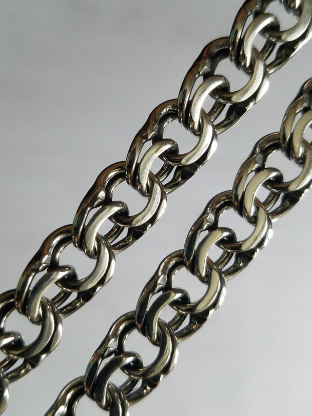 Silver weaving Bismarck. Ukrainian bracelets and chains - Photo, Image