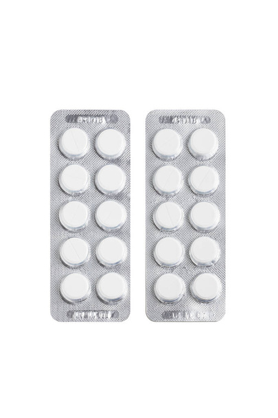 таблетки в упаковке, изолированной на белом фоне
 - Фото, изображение