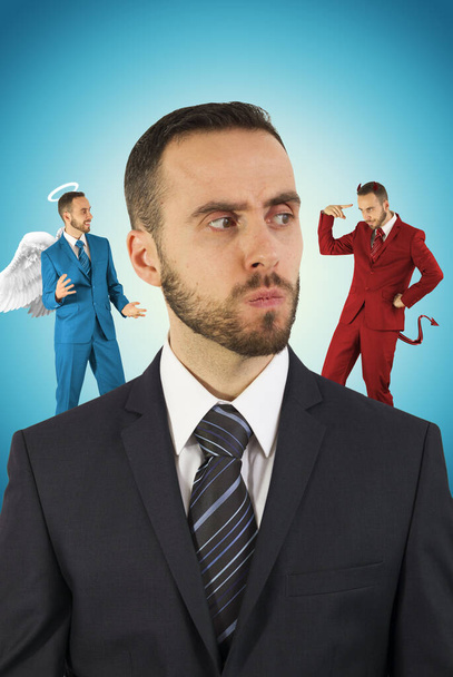 Businessman with angel and devil on his shoulders. - Photo, Image