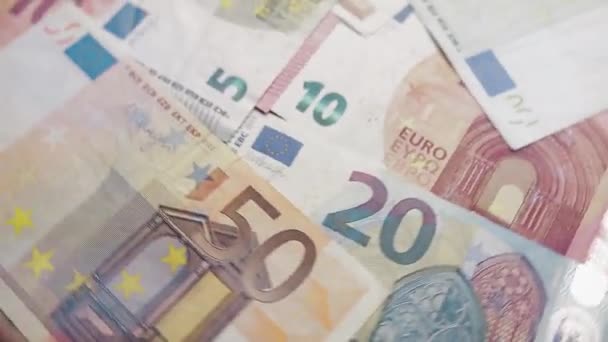 Евро банкноты крутятся или крутятся. Богатство, кризис, инвестиции, успех или бизнес-концепция
. - Кадры, видео