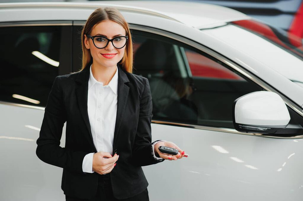 Young business woman driving in her car to work. Successful business concept. business woman driving - Фото, зображення
