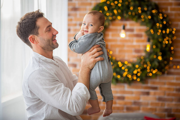christmas dad and little son smiling - Zdjęcie, obraz