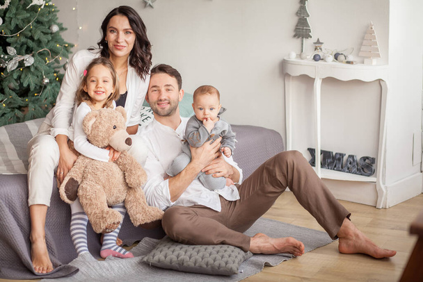 happy family smiling at home together - Fotoğraf, Görsel