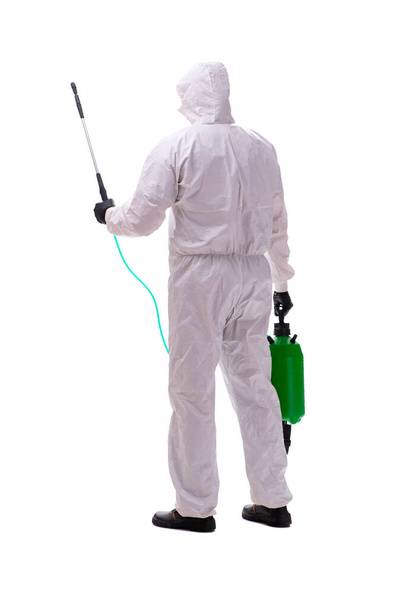 Young male contractor disinfecting in coronavirus concept - Photo, Image