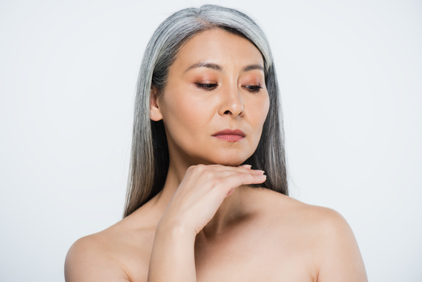 adult asian naked woman with perfect skin and grey hair isolated on grey - Φωτογραφία, εικόνα