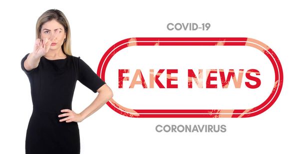 Coronavirus, Covid-19. Say no to fake news hoax movement. Woman doing no hand gesture isolated on white background. - Photo, Image