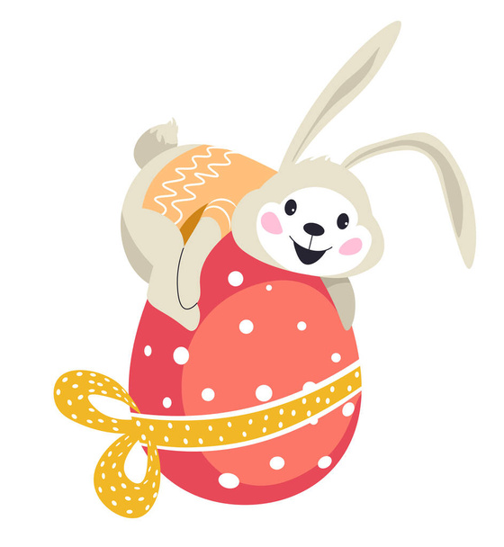 Пасхальний кролик сидить на декоративному яйці, загорнутому стрічкою
 - Вектор, зображення