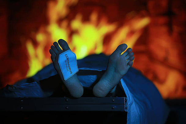смертность от коронавируса, труп сожжен в крематории, концепция ковида 19 пандемической инфекции, имитация морга
 - Фото, изображение