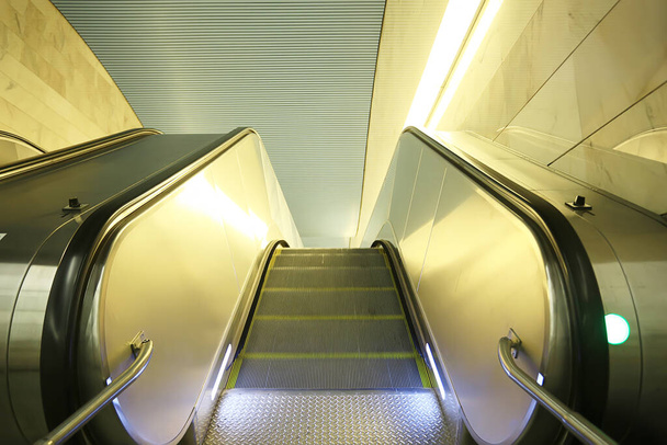 modern escalator abstract background, blurred light background geometry transport - Foto, imagen