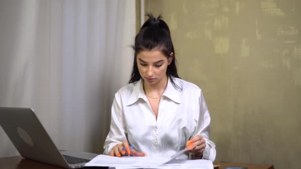 Business woman, stacks paper files for searching information on work desk office - Кадри, відео