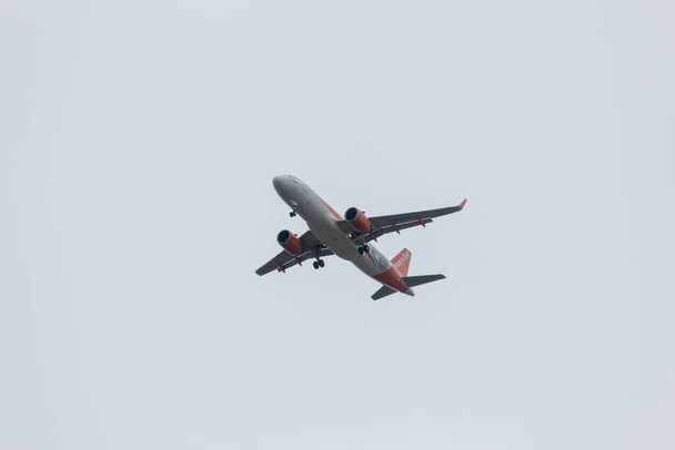 Pula, Croatia - May 19, 2019: big plane aircraft in overcast sky landing - Fotografie, Obrázek