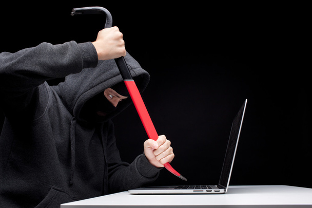 Computer hacker in a balaclava - Zdjęcie, obraz
