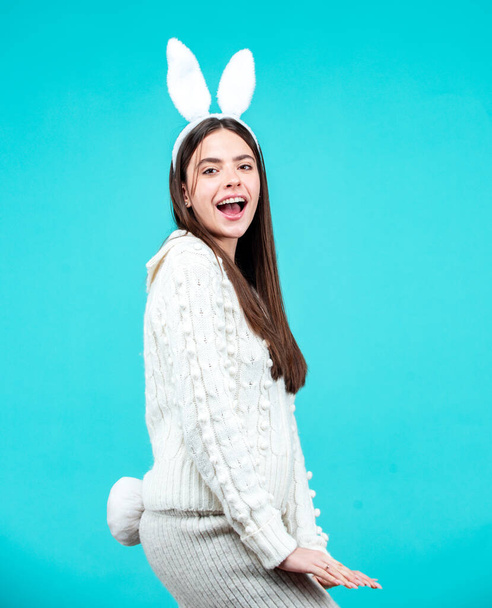 Lovely woman in Easter bunny rabbit costume. Surprised girl with bunny ears on Easter day. - Foto, immagini